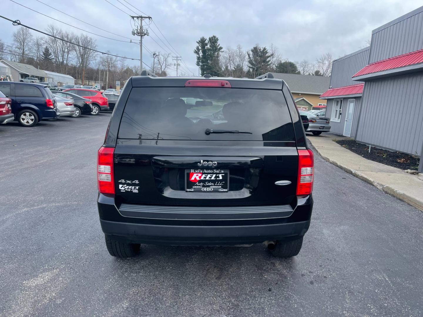 2017 Black /Black Jeep Patriot Latitude 4WD (1C4NJRFB5HD) with an 2.4L I4 DOHC 16V engine, 6-Speed Automatic transmission, located at 11115 Chardon Rd. , Chardon, OH, 44024, (440) 214-9705, 41.580246, -81.241943 - This 2017 Jeep Patriot Latitude with 4WD and only 55,000 miles on the odometer. This SUV comes equipped with a 2.4L engine for powerful performance. It features a comfortable and spacious interior with modern amenities. The 4WD capability ensures that you can handle any terrain or weather conditions - Photo#9